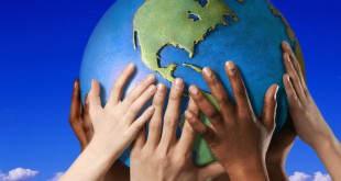Hands on a globe