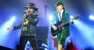 Australian rock band AC/DC's guitarist Angus Young (R) and US singer Axl Rose perform on stage in Vienna, Austria, on May 19, 2016. / AFP / APA / HANS KLAUS TECHT / Austria OUT        (Photo credit should read HANS KLAUS TECHT/AFP/Getty Images)